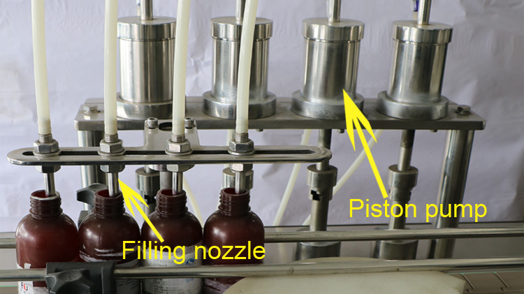 500ml bulat botol mengisi mesin dengan cap pengedap dan roda bintang berjalan